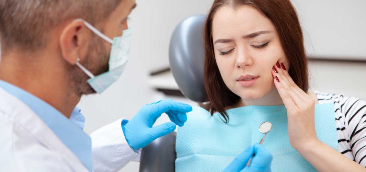 Woman having wisdom teeth consultation at dentist