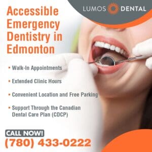 A close-up of a patient's open mouth during a dental examination, with a dentist's hand holding a dental mirror.